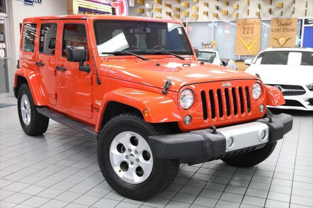 used 2015 Jeep Wrangler Unlimited car, priced at $19,896