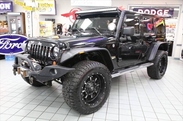 used 2012 Jeep Wrangler Unlimited car, priced at $17,896