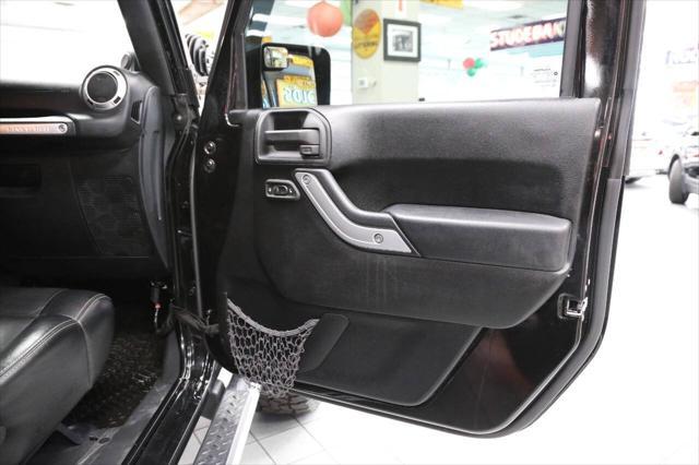 used 2012 Jeep Wrangler Unlimited car, priced at $17,896