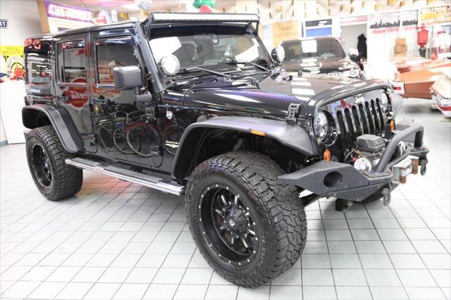 used 2012 Jeep Wrangler Unlimited car, priced at $17,896