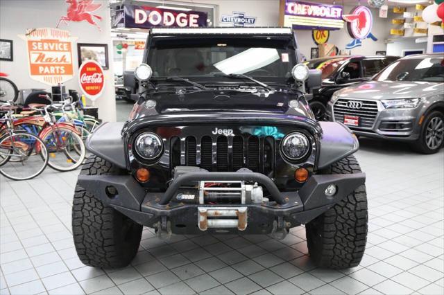 used 2012 Jeep Wrangler Unlimited car, priced at $17,896