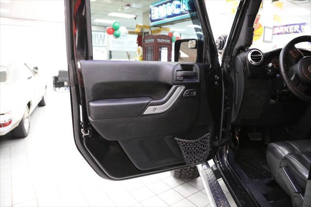 used 2012 Jeep Wrangler Unlimited car, priced at $17,896