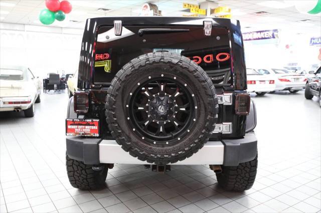 used 2012 Jeep Wrangler Unlimited car, priced at $17,896