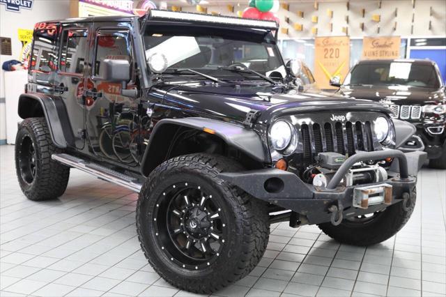 used 2012 Jeep Wrangler Unlimited car, priced at $17,896