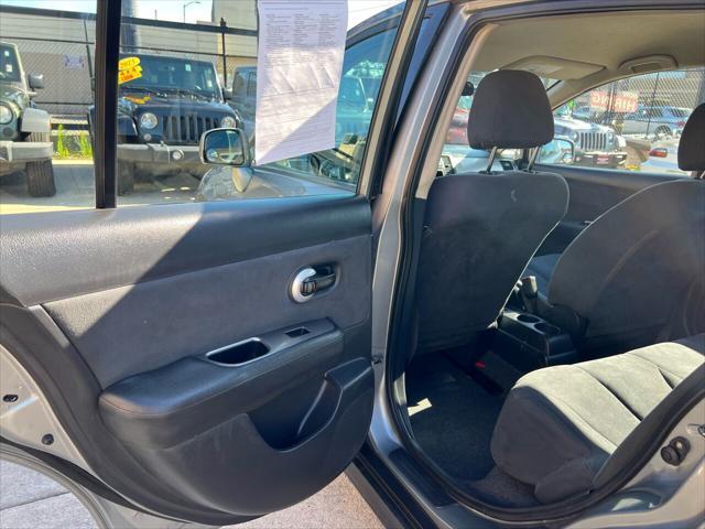 used 2009 Nissan Versa car, priced at $6,896