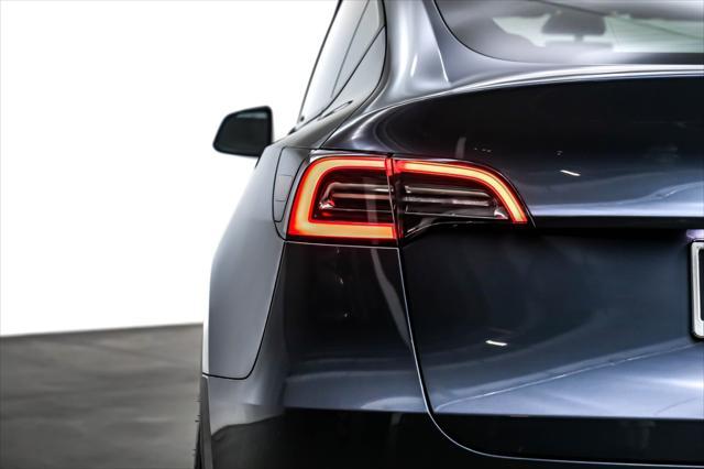 used 2023 Tesla Model Y car, priced at $35,894