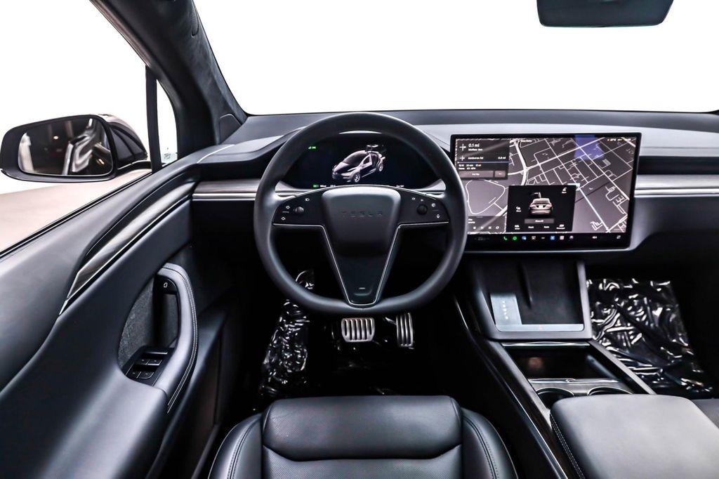 used 2024 Tesla Model X car, priced at $61,894