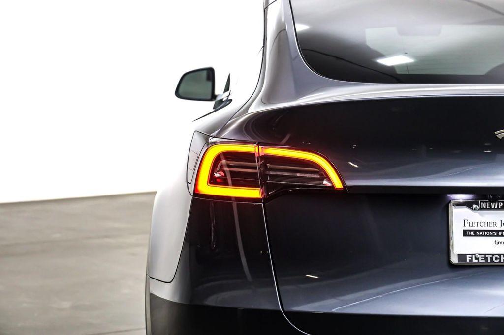 used 2023 Tesla Model Y car, priced at $28,394