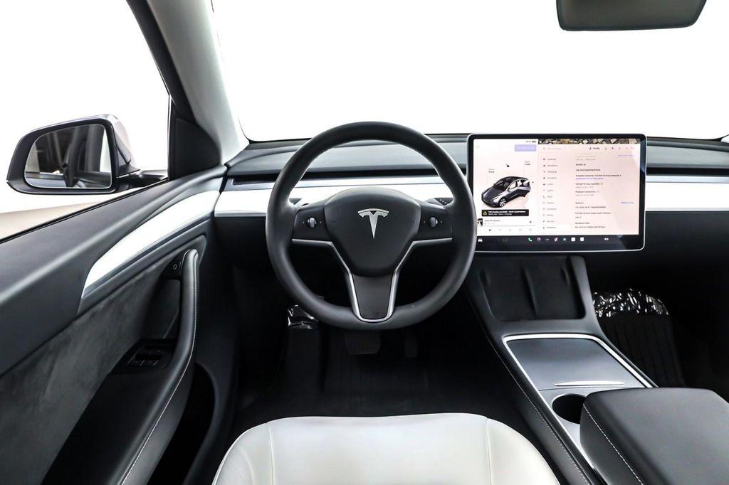 used 2023 Tesla Model Y car, priced at $28,394