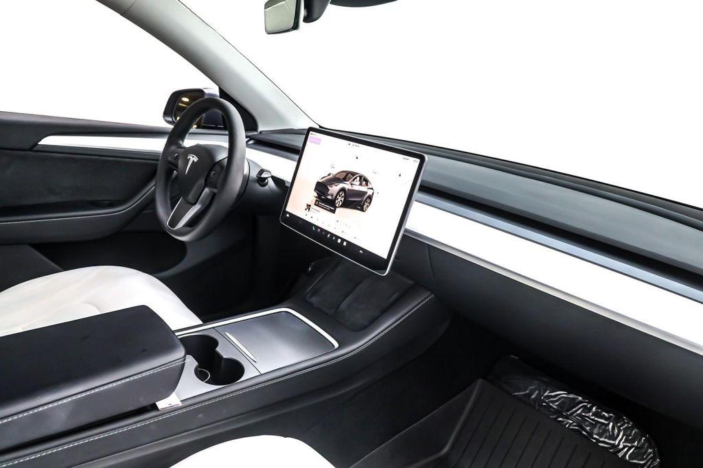 used 2023 Tesla Model Y car, priced at $28,394