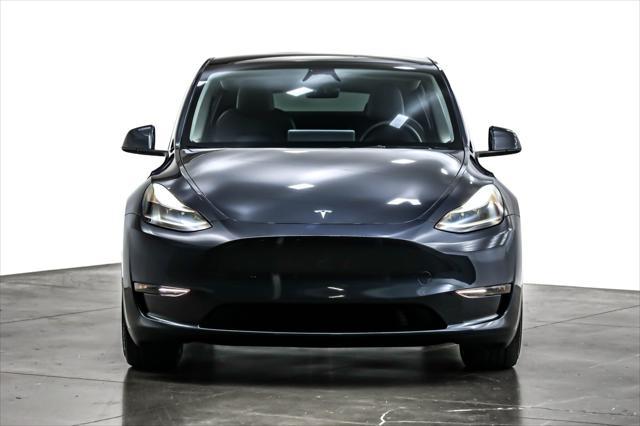 used 2024 Tesla Model Y car, priced at $43,894