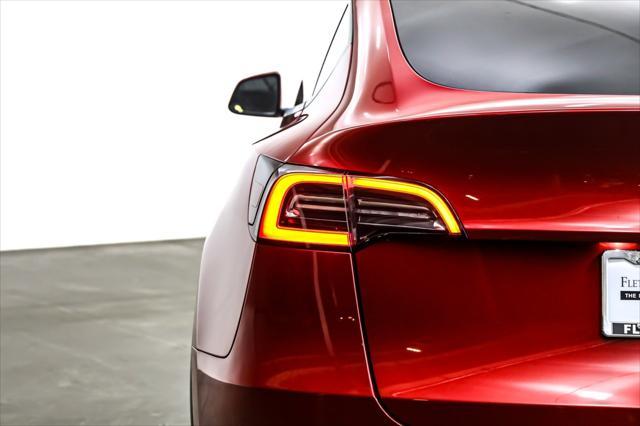 used 2023 Tesla Model Y car, priced at $27,892