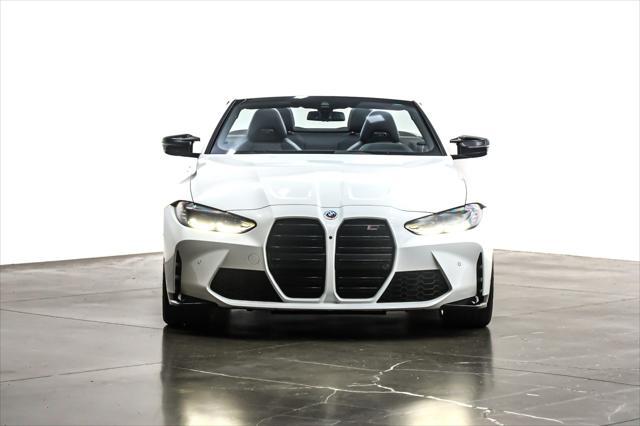 used 2022 BMW M4 car, priced at $67,892