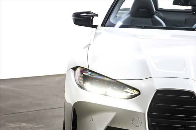 used 2022 BMW M4 car, priced at $67,892
