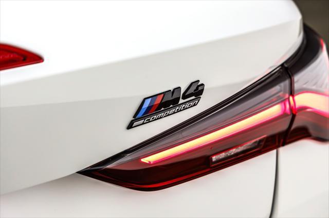 used 2022 BMW M4 car, priced at $67,892