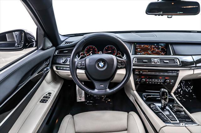 used 2015 BMW 740 car, priced at $23,894