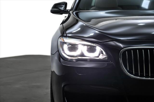 used 2015 BMW 740 car, priced at $23,894