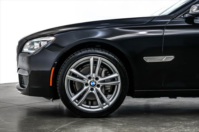 used 2015 BMW 740 car, priced at $23,894