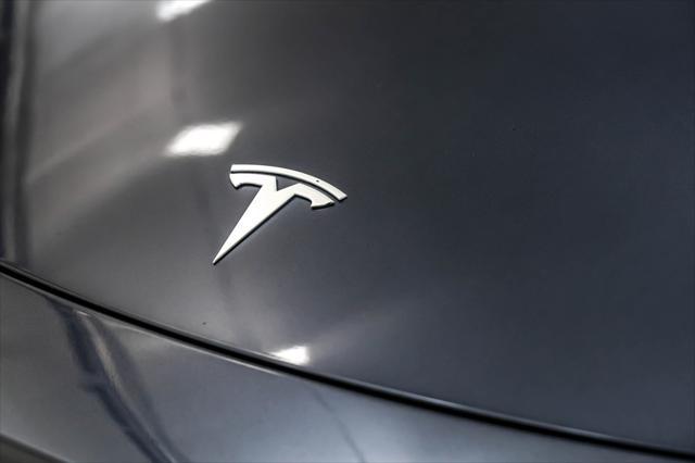 used 2023 Tesla Model Y car, priced at $33,894