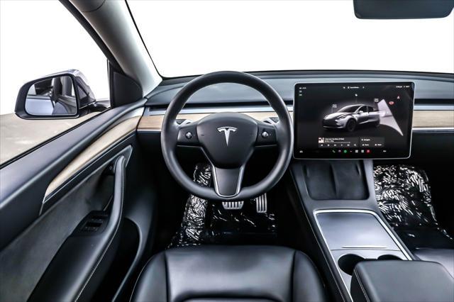 used 2023 Tesla Model Y car, priced at $33,894