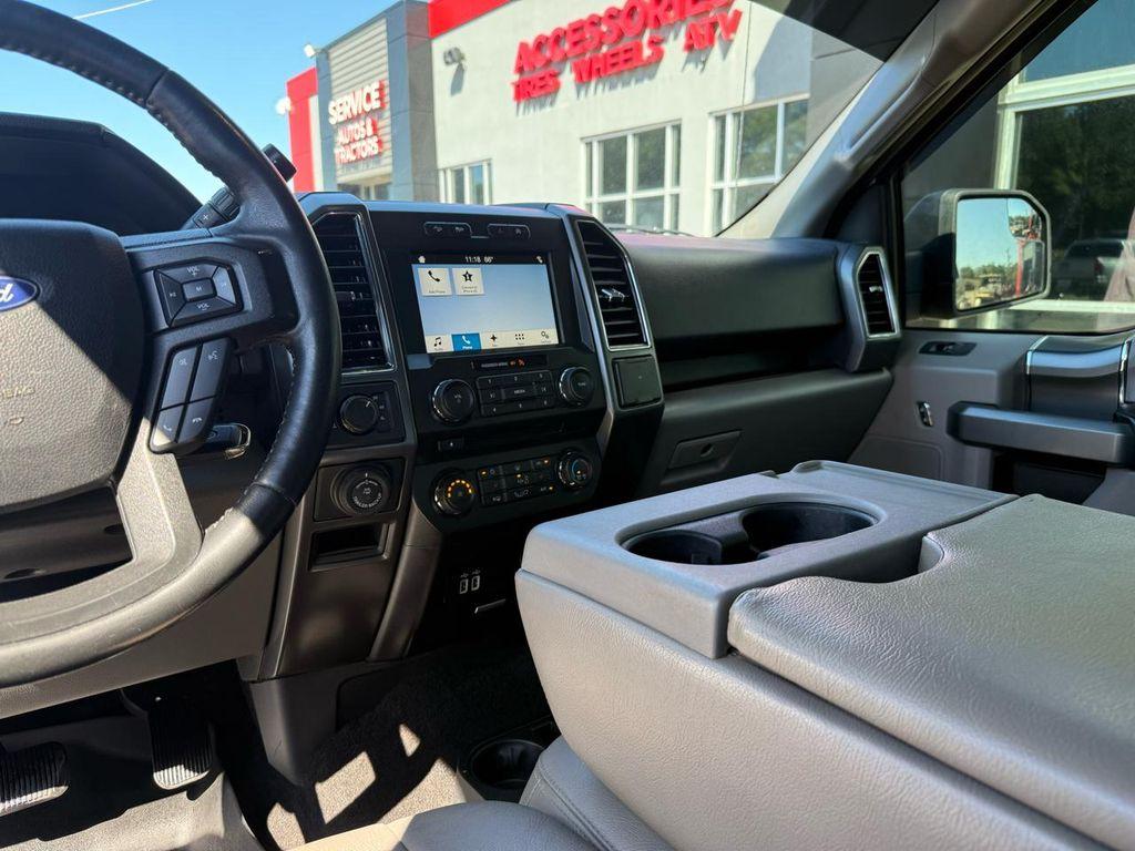 used 2018 Ford F-150 car, priced at $14,900
