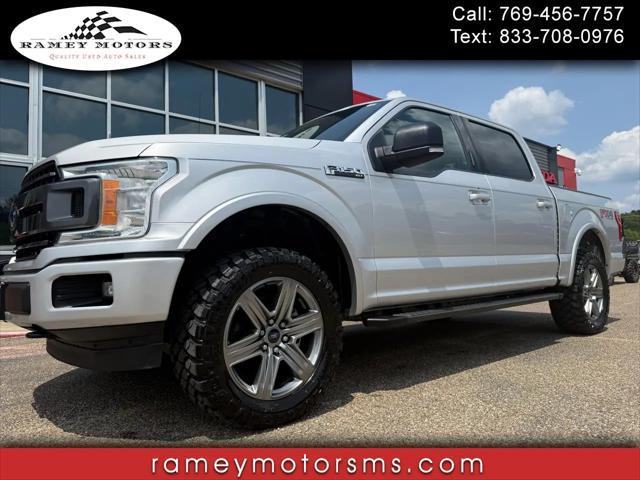 used 2018 Ford F-150 car, priced at $23,900