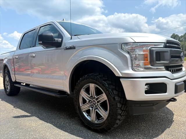 used 2018 Ford F-150 car, priced at $23,900