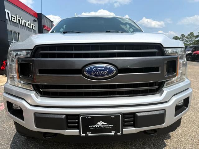 used 2018 Ford F-150 car, priced at $23,900
