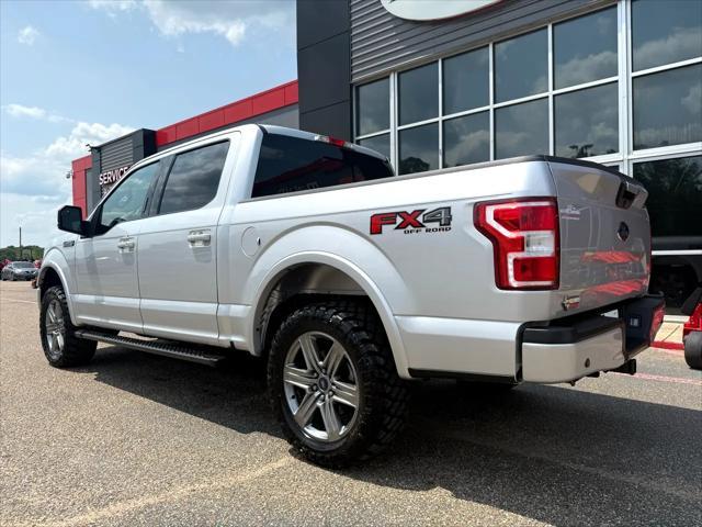 used 2018 Ford F-150 car, priced at $23,900