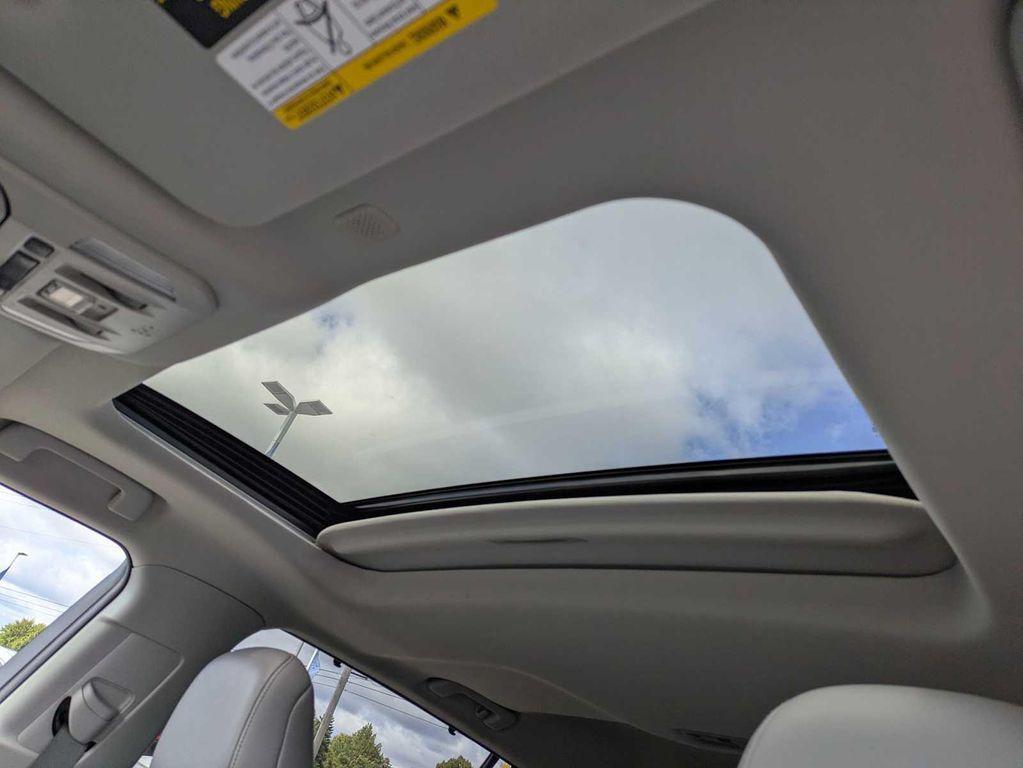 used 2021 Toyota Highlander Hybrid car, priced at $40,445