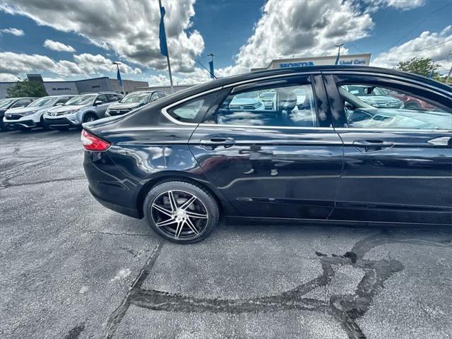 used 2015 Ford Fusion car, priced at $10,561