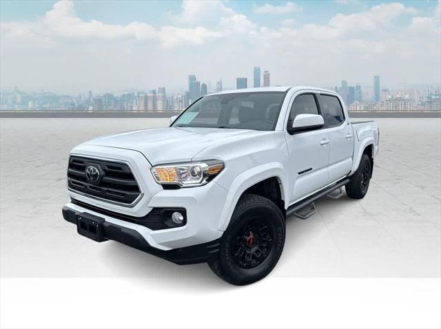 used 2019 Toyota Tacoma car, priced at $26,563