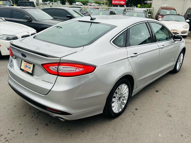 used 2013 Ford Fusion Energi car, priced at $8,390