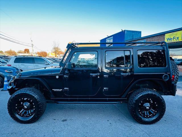 used 2014 Jeep Wrangler Unlimited car, priced at $16,990