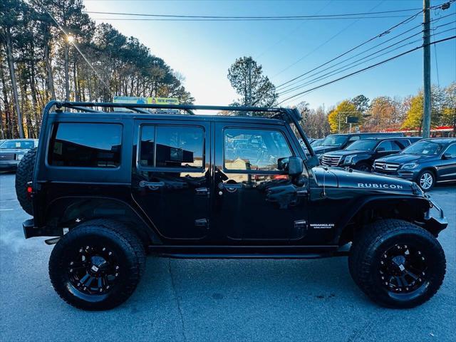 used 2014 Jeep Wrangler Unlimited car, priced at $16,990