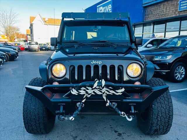 used 2014 Jeep Wrangler Unlimited car, priced at $16,990