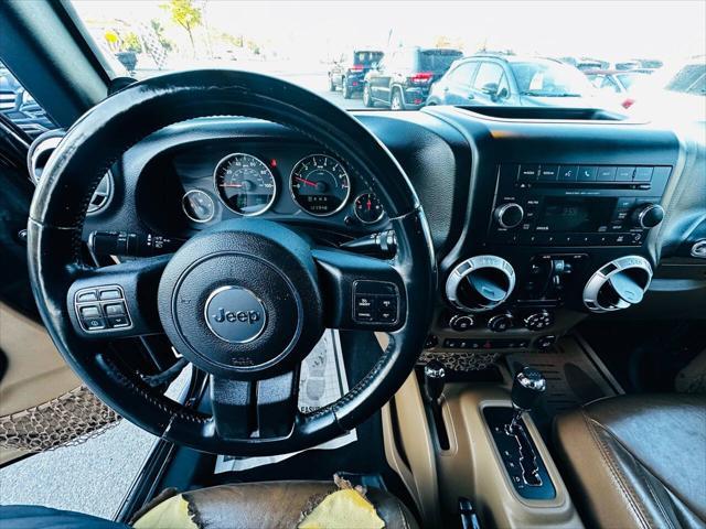 used 2014 Jeep Wrangler Unlimited car, priced at $16,990