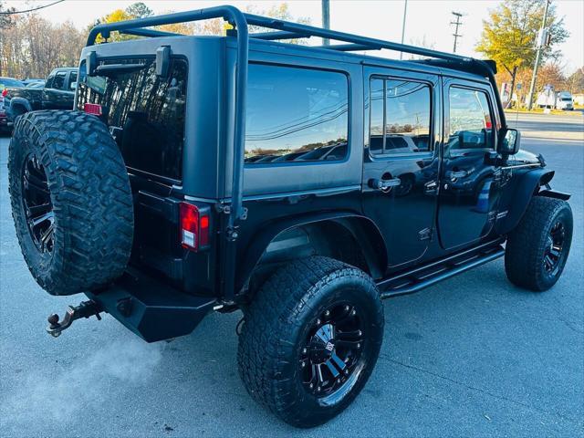 used 2014 Jeep Wrangler Unlimited car, priced at $16,990