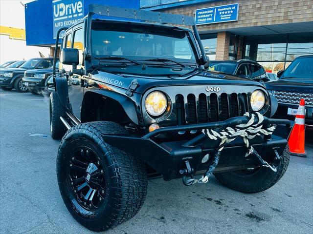 used 2014 Jeep Wrangler Unlimited car, priced at $16,990