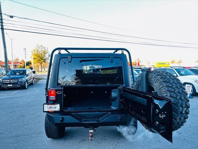 used 2014 Jeep Wrangler Unlimited car, priced at $16,990