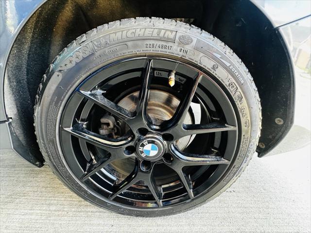 used 2015 BMW 228 car, priced at $9,990