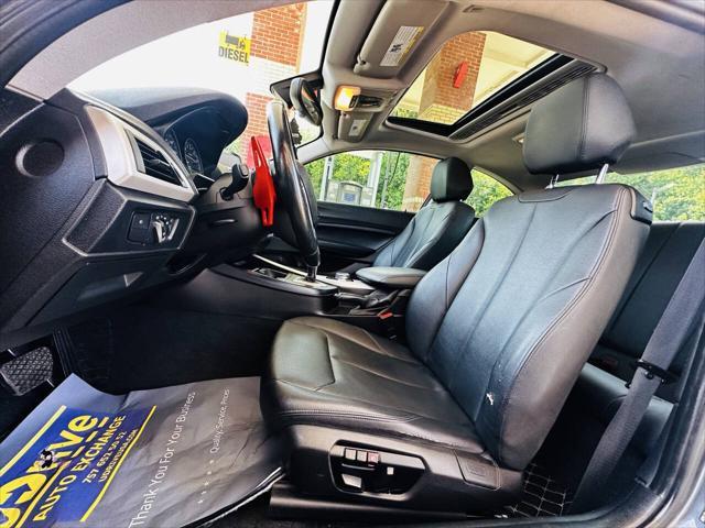 used 2015 BMW 228 car, priced at $9,990