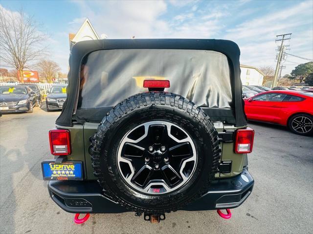 used 2015 Jeep Wrangler Unlimited car, priced at $16,990