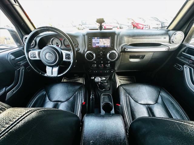 used 2015 Jeep Wrangler Unlimited car, priced at $16,990