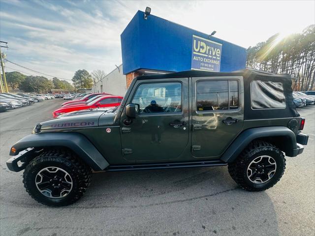 used 2015 Jeep Wrangler Unlimited car, priced at $16,990