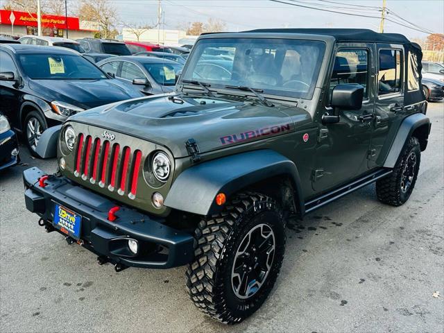 used 2015 Jeep Wrangler Unlimited car, priced at $16,990