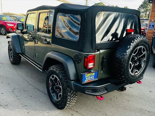 used 2015 Jeep Wrangler Unlimited car, priced at $16,990