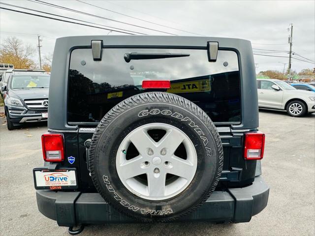 used 2013 Jeep Wrangler Unlimited car, priced at $11,990