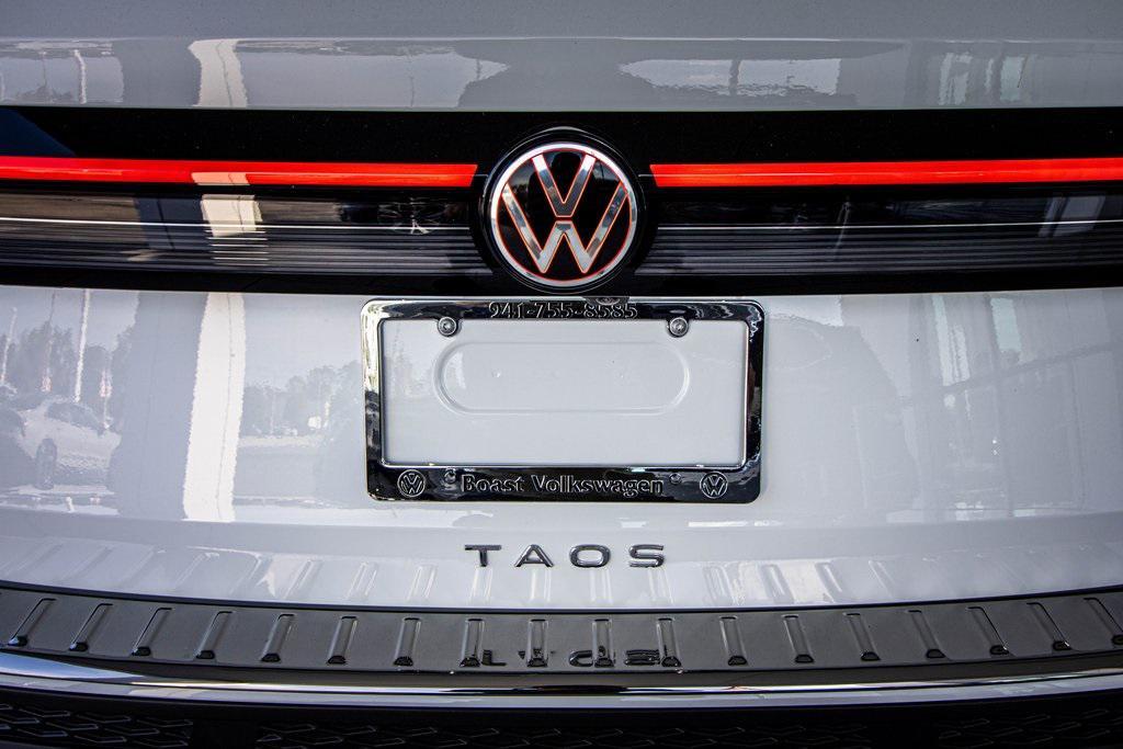 new 2025 Volkswagen Taos car, priced at $24,989