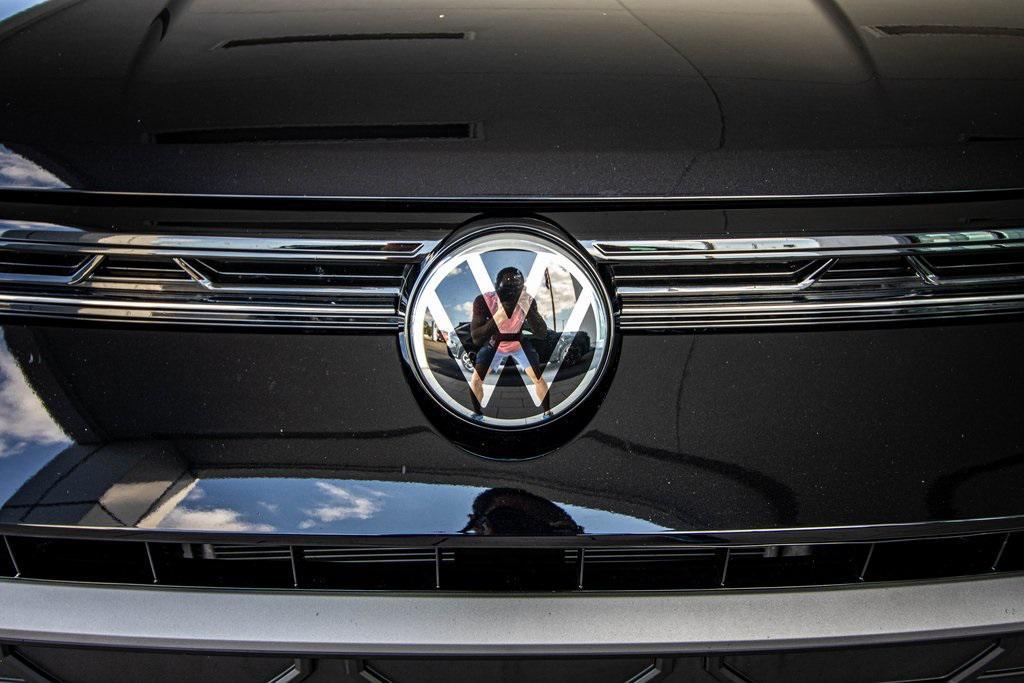 used 2025 Volkswagen Taos car, priced at $24,895